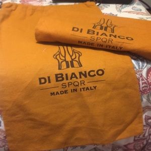 Pair of Di Bianco orange flannel dust bags